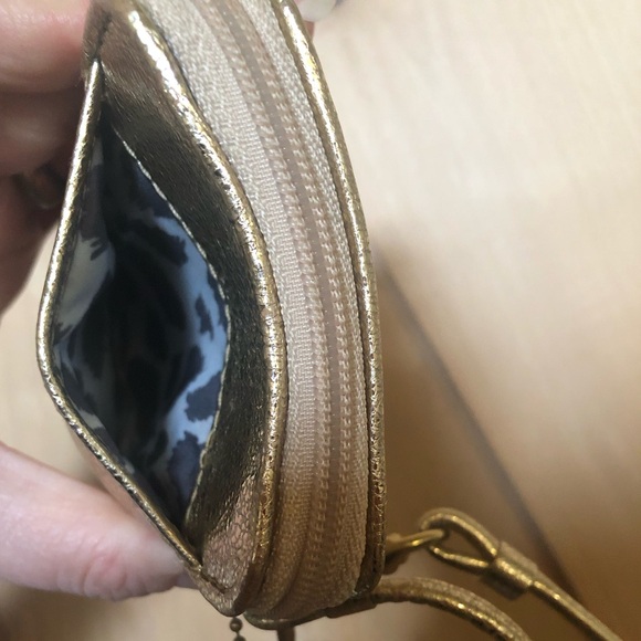 COACH Poppy metallic gold wristlet